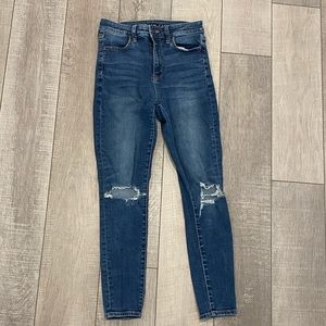 American Eagle dark blue skinny jeans with holes